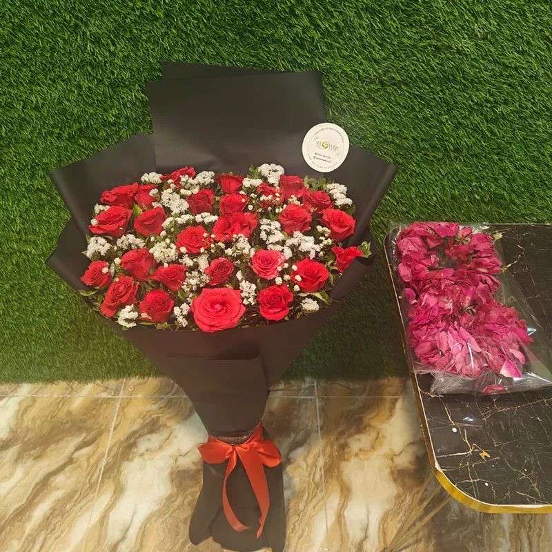50 Red Roses bouquet with a separate packet of rose petals (shaped like an initial)